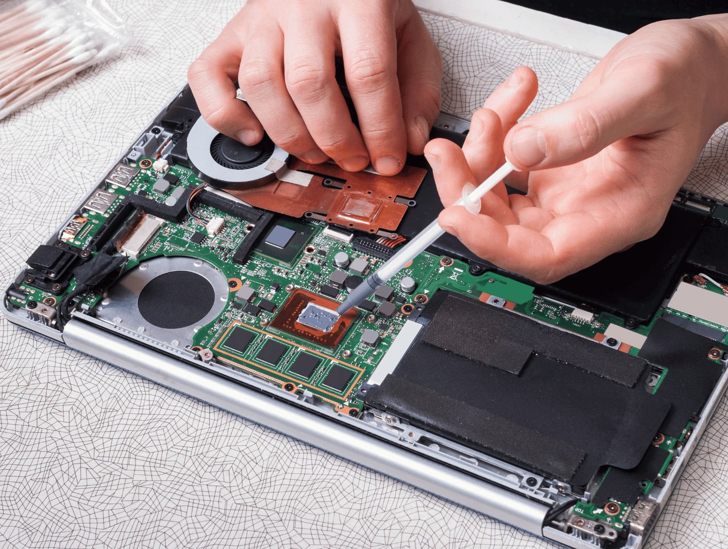 Replacing the themal paste  of a laptop can reduce warping 